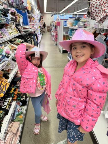 Trying hats at 5 Below